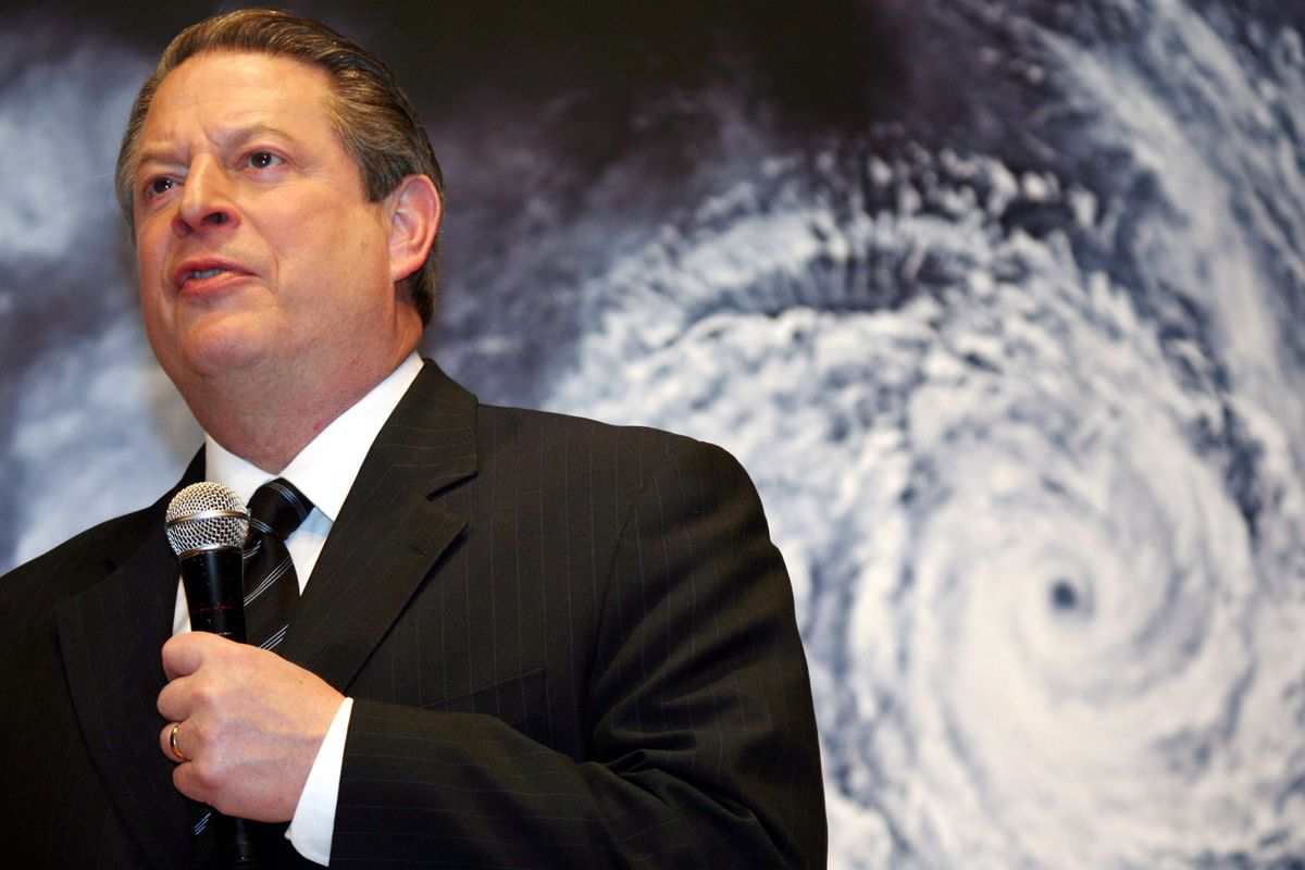 FILE - In this Monday, Jan. 15, 2007 file photo, former U.S. Vice President Al Gore speaks in front of a poster for his documentary film on global warming, "An Inconvenient Truth," during the Japanese premier in Tokyo. On Wednesday, Nov. 14, 2012, Gore will launch a 24-hour online talkfest about global warming and disasters. Superstorm Sandy, the rare and devastating Northeast storm, and an election that gave Democrats gains have put global warming back in the picture. (Koji Sasahara / Associated Press)