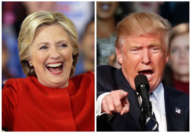 This combination of photos taken at late-night campaign rallies shortly after midnight on Tuesday, Nov. 8, 2016, shows Democratic presidential candidate Hillary Clinton in Raleigh, N.C., and Republican presidential candidate Donald Trump in Grand Rapids, Mich. A polarized America went to the polls Tuesday to pick its 45th president. (AP Photo/Gerry Broome, Paul Sancya) 