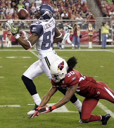 Seahawks receiver Ricardo Lockette makes a touchdown catch over Cardinals cornerback Marshay Green. (Associated Press)
