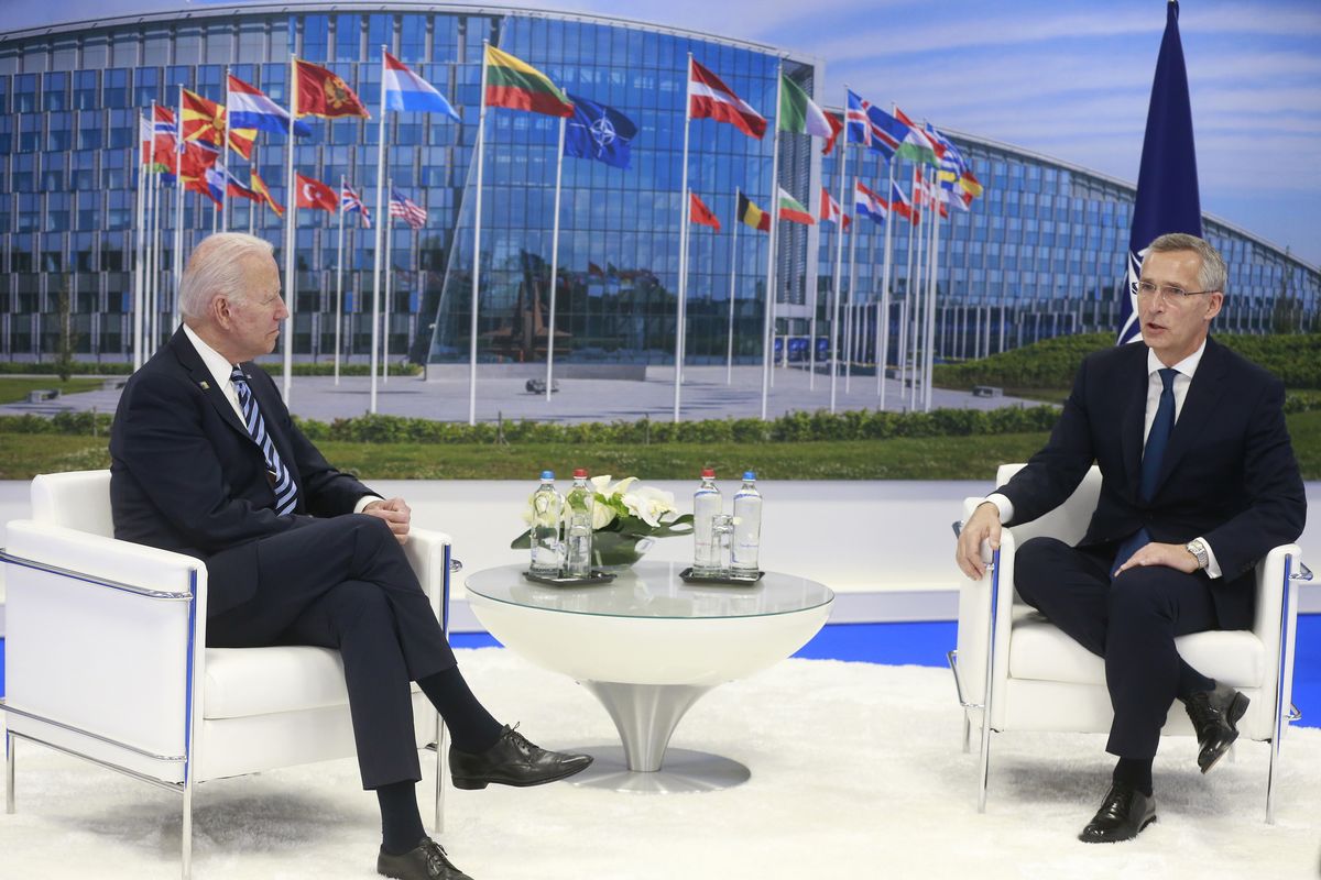 NATO Secretary General Jens Stoltenberg speaks with U.S. President Joe Biden during a bilateral meeting on the sidelines of a NATO summit at NATO headquarters in Brussels, Monday, June 14, 2021. U.S. President Joe Biden is taking part in his first NATO summit, where the 30-nation alliance hopes to reaffirm its unity and discuss increasingly tense relations with China and Russia, as the organization pulls its troops out after 18 years in Afghanistan.  (Stephanie Lecocq)