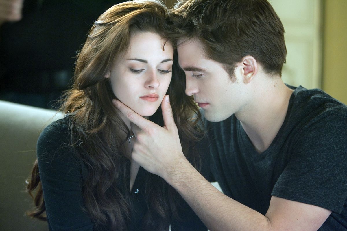 This film image released by Summit Entertainment shows Kristen Stewart, left, and Robert Pattinson in a scene from "The Twilight Saga: Breaking Dawn Part 2." (Andrew Cooper / Summit Entertainment)