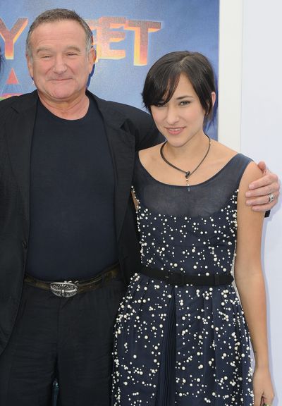 Robin Williams stands in 2011 with his daughter, Zelda, at the premiere of 