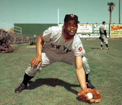 In this 1952, file photo, San Francisco Giants infielder Monte Irvin poses during spring training. Irvin, a Hall of Fame power-hitting outfielder who starred for the New York Giants in the 1950s in a career abbreviated by Major League Baseball’s exclusion of black players died Monday night, Jan. 11, 2016, of natural causes at his Houston home. He was 96.