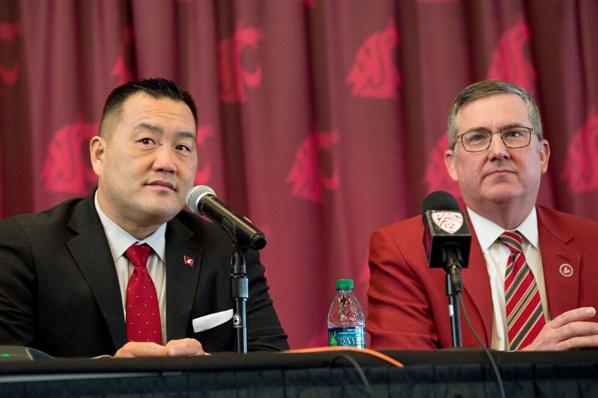 Pat Chun, left, Washington State’s athletic director, fields questions with university president Kirk Schulz in this January 2018 photo. Both men addressed questions from the WSU Board of Regents on Friday morning about the university’s athletics deficit totaling $11.5 million this year, and its budget for 2024.  (Tyler Tjomsland / The Spokesman-Review)