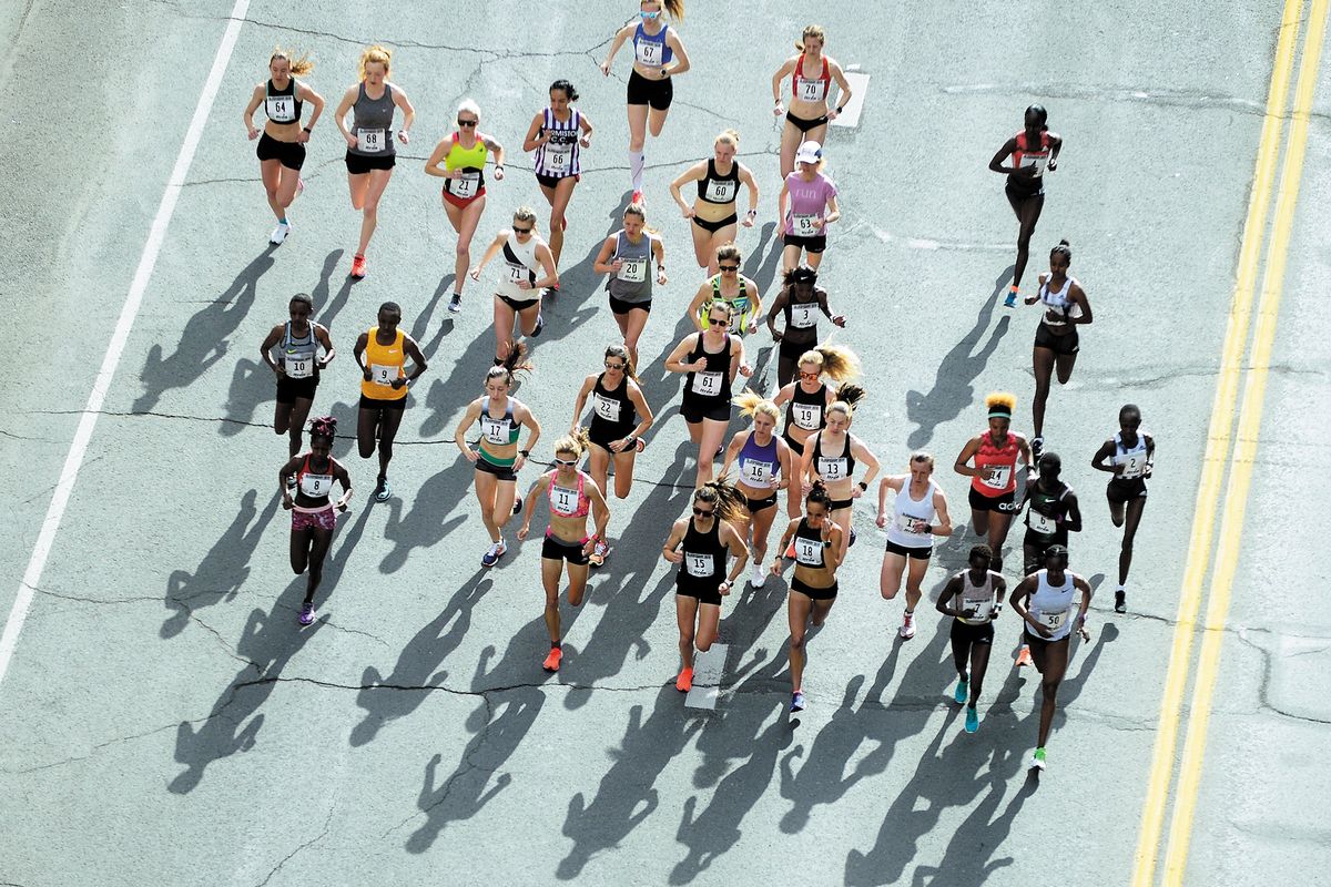 The elite women run down Riverside at the start of Bloomsday 2019.  (LIZ KISHIMOTO)