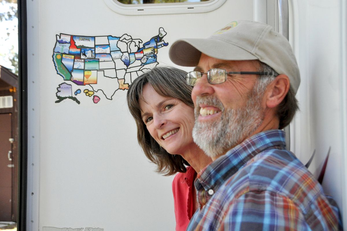 Retirees and full-time RVers Susan and Larry Dach opted to serve as campground hosts at Dragoon Creek Campground to be close to family this summer. (Rich Landers)