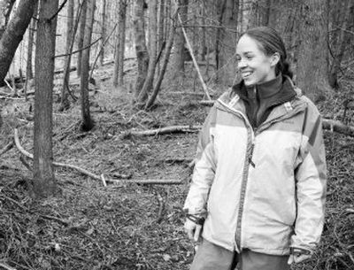 
Katie Voelke hikes through the Crosel Creek property March 15.  Voelke hopes to return the forested land above the Crosel Creek flood plain to a more natural state. 
 (Associated Press / The Spokesman-Review)