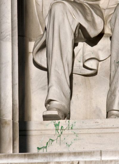 Splattered paint is seen on the right shoe area of the Abraham Lincoln statue at the Lincoln Memorial in Washington, D.C. (Associated Press)
