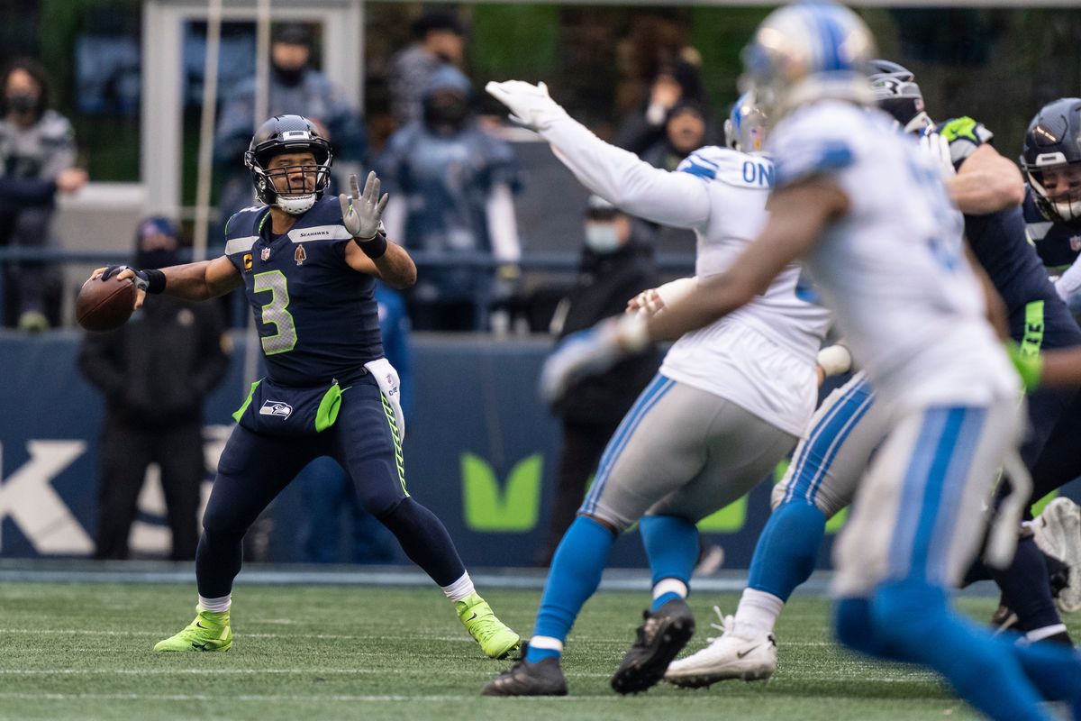 Seattle’s Russell Wilson completed 20 of 29 passes for 236 yards and four TDs during last Sunday’s win over Detroit.  (Stephen Brashear)