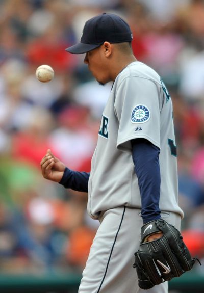 Mariners starter Felix Hernandez has just one win in August but his ERA is still second-best in the A.L. (Associated Press / The Spokesman-Review)