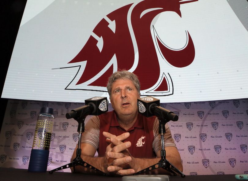 Washington State coach Mike Leach speaks at the Pac-12 NCAA college football media day in Los Angeles on July 14. On Tuesday, Leach accused the media and the local police of unfairly targeting WSU football players. (Reed Saxon / Associated Press)