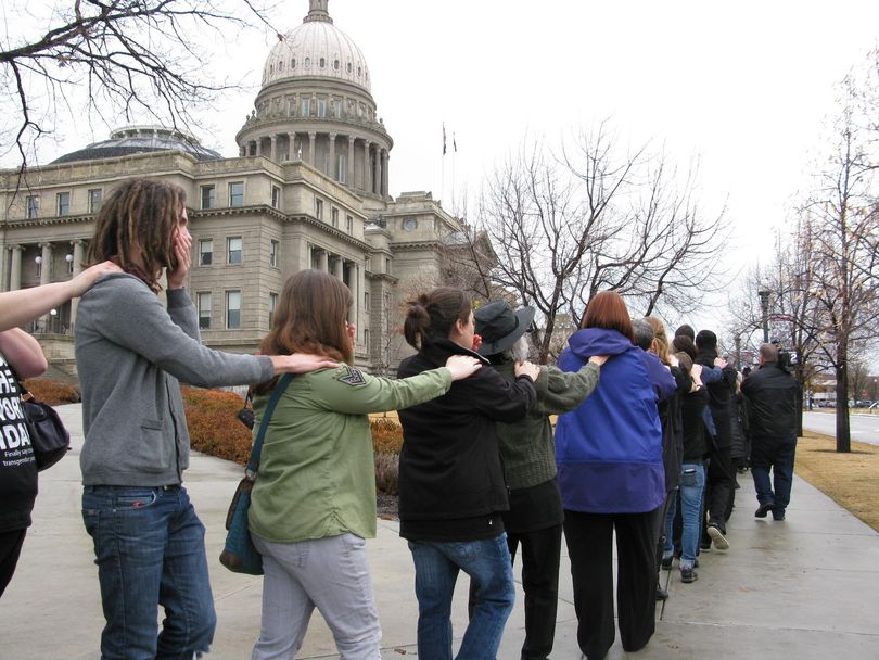 'Add the Words' protesters march around the state Capitol on Thursday (Betsy Russell)