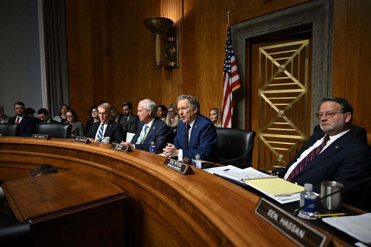 Sen. Rand Paul (R-Ky.), chairman of the Senate Homeland Security Committee, questions Sen. Markwayne Mullin (R-Okla.), President Donald Trump