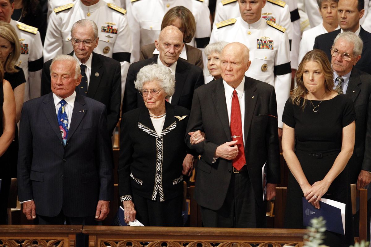 From left, astronaut Buzz Aldrin, Annie Glenn, astronaut and former Ohio Sen. John Glenn, and singer Diana Krall, stand during the opening processional at the Washington National Cathedral in Washington, Thursday, Sept. 13, 2012,  during a national memorial service for the first man to walk on the moon, Neil Armstrong. (Ann Heisenfelt / Fr13069 Ap)