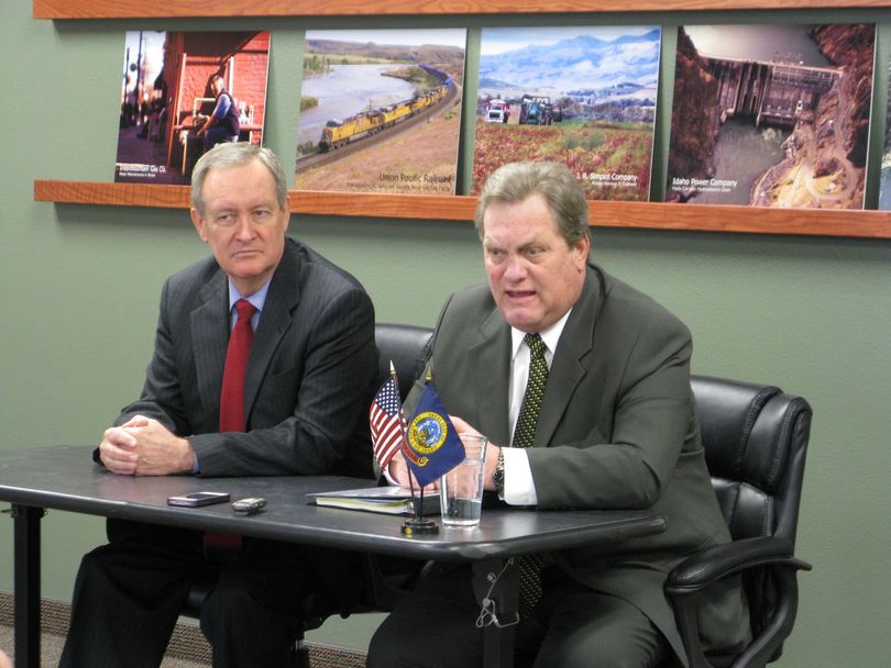 Idaho Sen. Mike Crapo, left, and Congressman Mike Simpson, right, talk with reporters about the federal budget crisis on Tuesday. (Betsy Russell)
