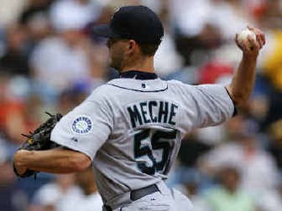 
Seattle Mariners starting pitcher Gil Meche throws during the first inning against the Chicago White Sox.
 (Associated Press / The Spokesman-Review)