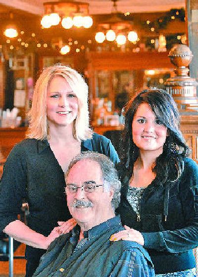 
 Tom Millersmith of Hair Etc. offered work space to Des Alderman, left, and Rachael Pecka after Alderman's Essence Salon was damaged by fire. 
 (Dan Pelle / The Spokesman-Review)