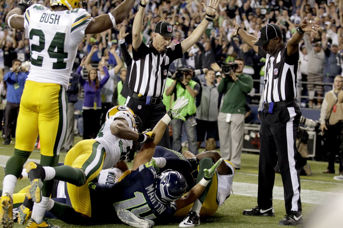 NFL replacement officials signal a touchdown that will be disputed by Packers fans until the end of time. (Associated Press)