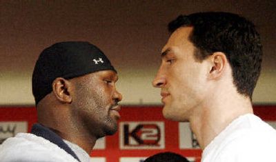 
Wladimir Klitschko, right, faces off with Ray Austin today. 
 (Associated Press / The Spokesman-Review)