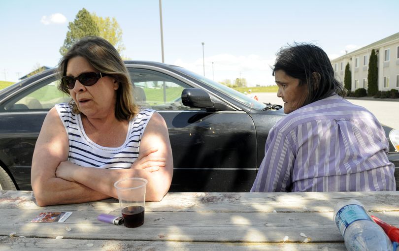 Betty Bachmeyier, left, and Rita (who declined to give her last name) sit outside the Sleep Inn in Post Falls on Wednesday. They have been staying there since the fire but will have to leave by the end of the week. The stay is costing Northeast Washington Housing Solutions about $1,400 a day.jesset@spokesman.com (Jesse Tinsley)