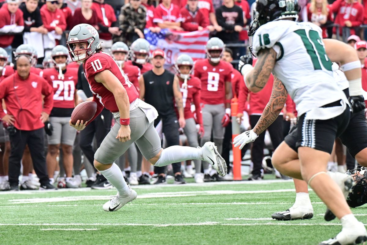 Washington State Cougars quarterback John Mateer (10) scrambles for a touchdown against the Hawaii Warriors during the second half of a college football game on Saturday, Oct. 19, 2024, at Gesa Field in Pullman, Wash. WSU won the game 42-10.  (Tyler Tjomsland/The Spokesman-Review)