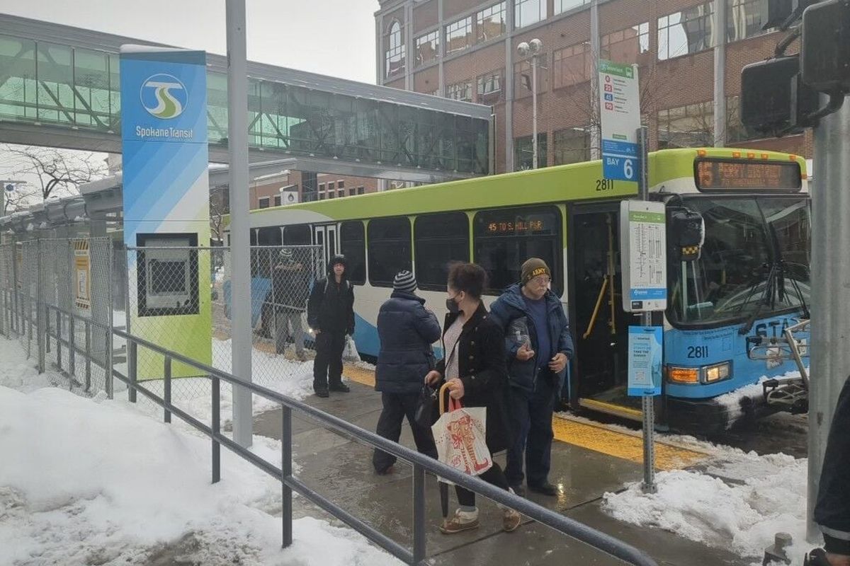 Despite the snow, buses with the Spokane Transit Authority were operating relatively normally on Wednesday, Nov. 30.  (Emry Dinman/The Spokesman-Review)