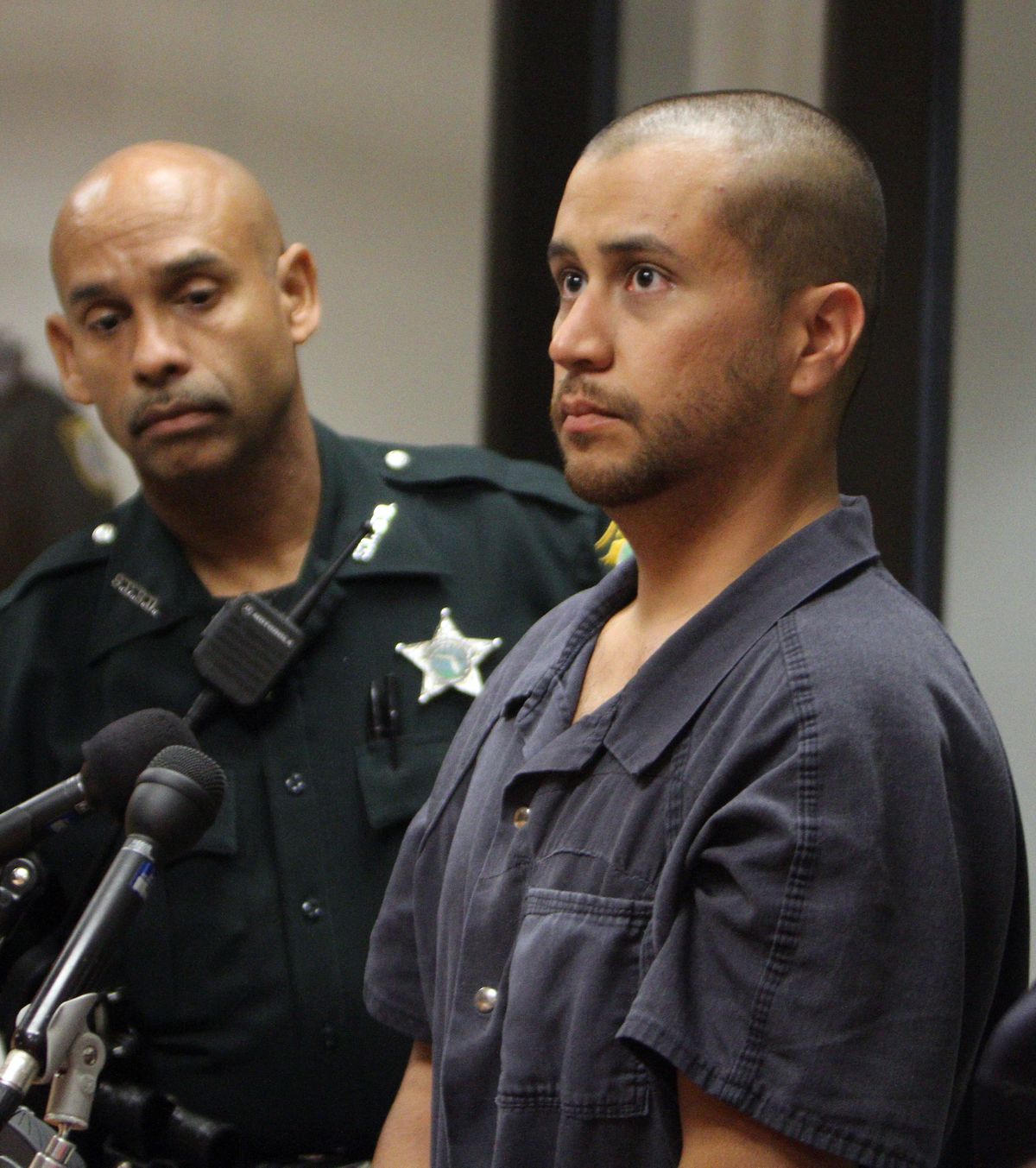 George Zimmerman, right, attends a court hearing Thursday in Sanford, Fla. (Associated Press)