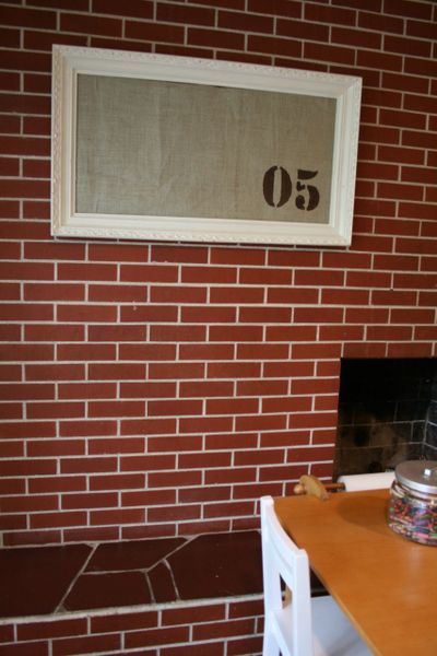 Step 11: Once the glue has dried, hang the framed cork board somewhere that's easily accessible. (Megan Cooley)