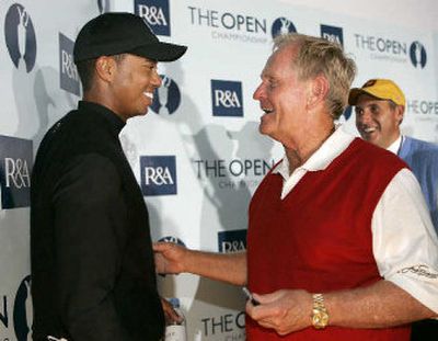 
Jack Nicklaus, right, greets Tiger Woods after a news conference following the second round of the British Open on Friday.
 (Associated Press / The Spokesman-Review)