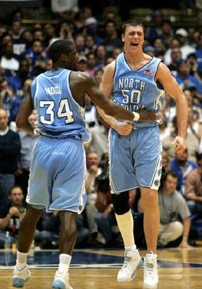 
UNC's David Noel, left, and Tyler Hansbrough celebrate win. 
 (Associated Press / The Spokesman-Review)