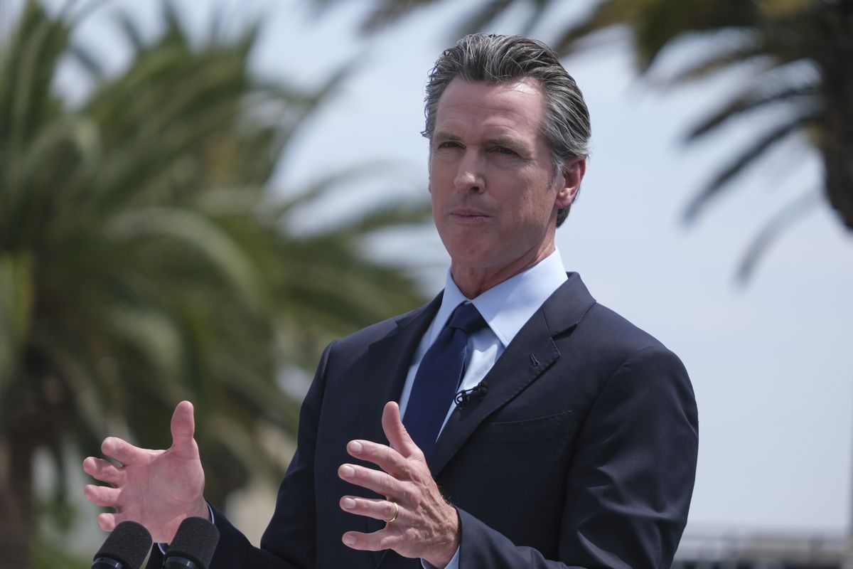In this June 15, 2021 photo, California Gov. Gavin Newsom talks during a news conference at Universal Studios in Universal City, Calif. California on Saturday released a list of 41 people who filed the required paperwork to run in the Sept. 14 recall election that could remove Newsom from office.  (Ringo H.W. Chiu)