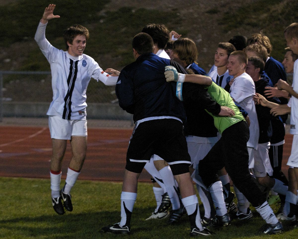 Central Valley’s Holden Newberg celebrate his winning goal against Lewis and Clark on Friday night at CV. (Colin Mulvany / The Spokesman-Review)
