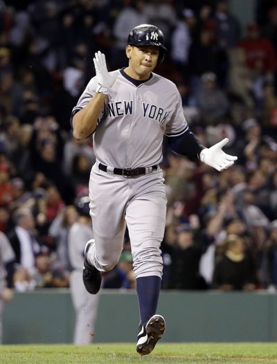 New York’s Alex Rodriguez celebrates after his go-ahead homer in the eighth inning. (Associated Press)