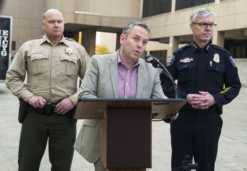 Mayor David Condon, center, with Spokane County Sheriff Ozzie Knezovich, left and interim Spokane police Chief Rick Dobrow spoke at a news conference Thursday afternoon to address the investigation of the alleged assault by patrol Sgt. Gordon Ennis against a female officer that occurred at a party hosted by fellow officer Doug Strosahl Saturday night. (Colin Mulvany / The Spokesman-Review)