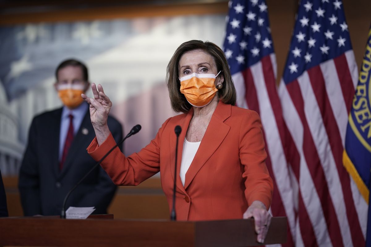 Speaker of the House Nancy Pelosi, D-Calif., holds a news conference on passage of gun violence prevention legislation, at the Capitol in Washington, Thursday, March 11, 2021, as Sen. Richard Blumenthal, D-Conn., looks on. (J. Scott Applewhite)