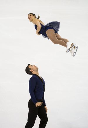 Canada's Eric Radford and Meagan Duhamel with Team North America, perform a throw during their 2016 Team Challenge Cup's pairs free skate program, April 23, 2016, at the Spokane Arena in Spokane, Wash. (Colin Mulvany / The Spokesman Review)