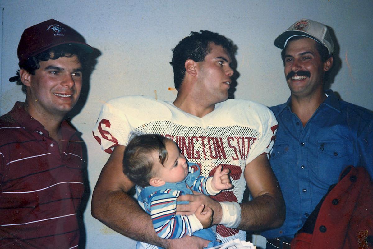 Charlie Wulff was the center of attention as a baby, guarded by, left to right, uncles Tom and Paul, and father Carl. Photo courtesy of Mathew Rocha (Photo courtesy of Mathew Rocha / The Spokesman-Review)