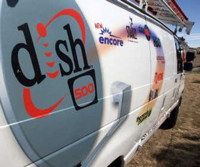 
Dish markets itself as an economical alternative to its larger rival, DirecTV. Associated Press
 (File Associated Press / The Spokesman-Review)