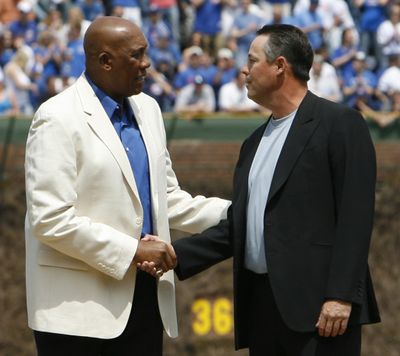 Former Chicago Cubs players Ferguson Jenkins, left, and Greg Maddux share a common bond.  (Associated Press / The Spokesman-Review)