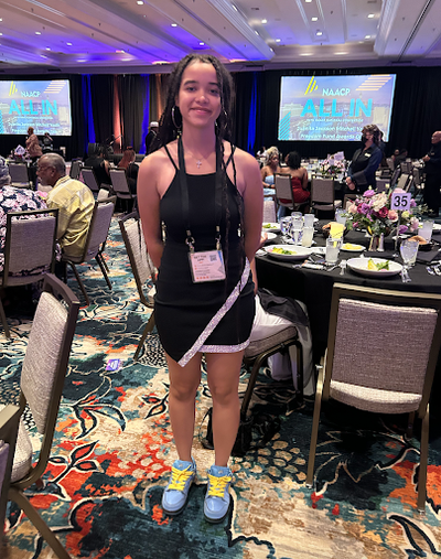 May Jefferson, of the Spokane-branch NAACP Youth Council, stands at the annual NAACP National Convention.  (Courtesy)