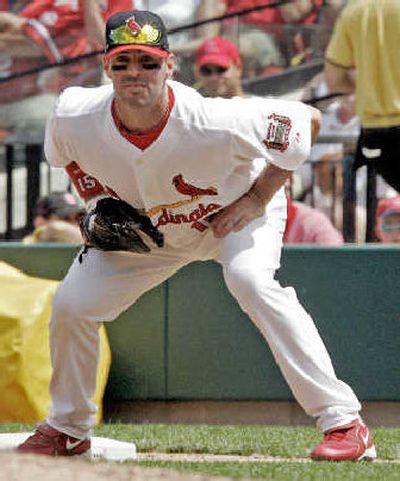 Pujols' injury forces Cards to shuffle