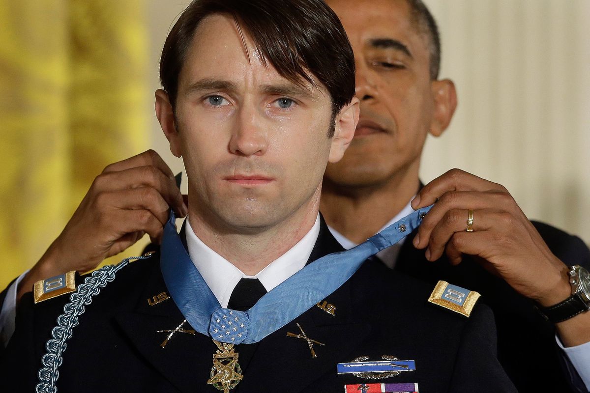 President Barack Obama awards the Medal of Honor to former Army Capt. William D. Swenson, of Seattle, at the White House on Tuesday. (Associated Press)