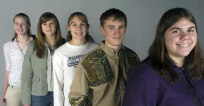 
The finalists in the 2005 Spokesman-Review Outdoor Writing Contest for high school students are, from left to right: Jacqueline Robinette, freshman at Cheney High School; Jessica Knezovich and Jenny Knezovich, both juniors from Reardan High School; Justin Wood, freshman from Davenport High School; and Casey Thomas, freshman from Post Falls High School. 
 (Amanda Smith / The Spokesman-Review)