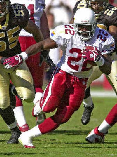 
Emmitt Smith, the NFL's all-time rushing leader, has run with youthful vigor for Arizona this season. 
 (Associated Press / The Spokesman-Review)