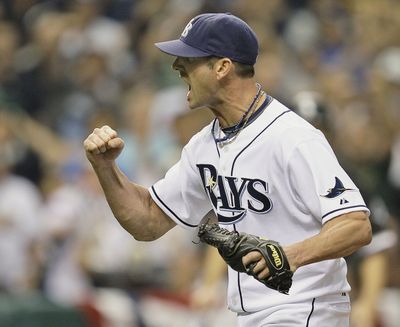 Tampa Bay reliever Grant Balfour reacts after striking out Orlando Cabrera with the bases loaded in the seventh inning Thursday.  (Associated Press / The Spokesman-Review)