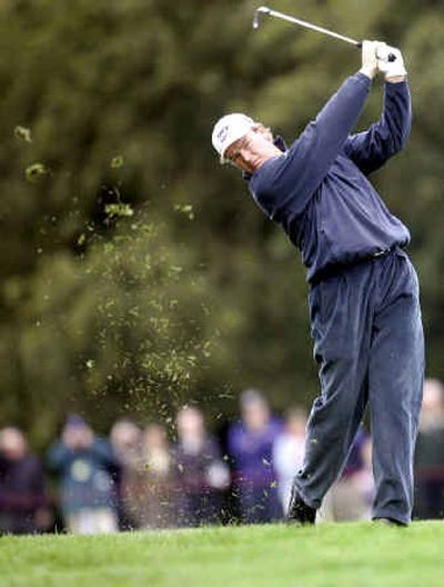 
Ernie Els takes a shot from the 17th fairway on his way to a record-setting sixth World Match Play title.
 (Associated Press / The Spokesman-Review)