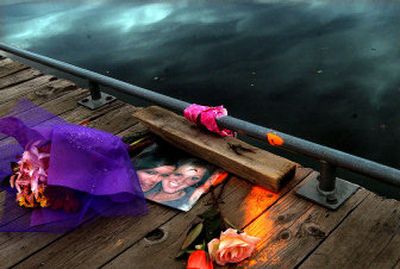 
A makeshift memorial was placed near where Alice Rebecca Greely and Charlie Rae Buckingham drowned early Saturday in Hayden Lake. 
 (Kathy Plonka / The Spokesman-Review)