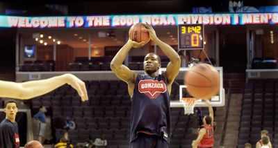 Framed by a luxury suite and the NCAA video banner, Gonzaga’s Ira Brown works on his shooting touch Thursday during practice in Memphis, Tenn.  (Christopher Anderson / The Spokesman-Review)