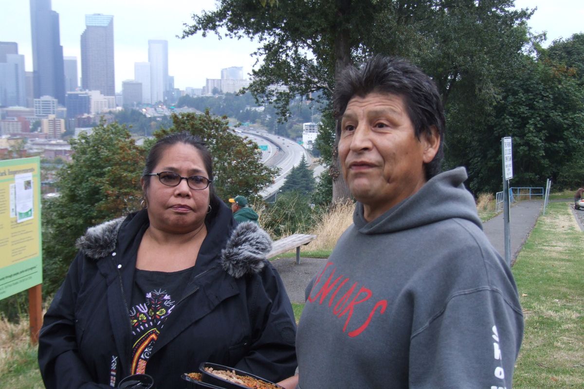 Seattle residents Joe and Nellie Salinas take care of more than 70 'street cats' by setting up feed stations through the area. (Paul K. Haeder / Down to Earth NW Correspondent)
