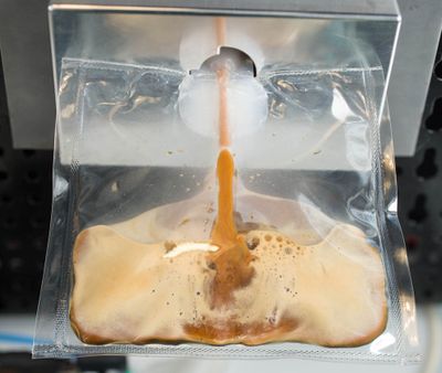 This undated product image, provided by Italian coffee giant Lavazza, shows a prototype of Lavazza and Argotec’s “ISSpresso” machine. A version of the coffeemaker is scheduled for launch today to the International Space Station aboard a supply capsule. (Associated Press)